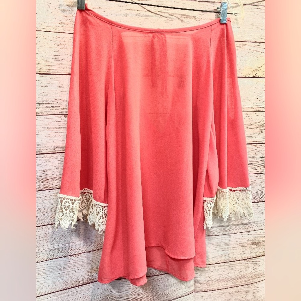 Beautiful open back tie top w/sleeve accents